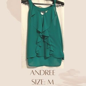 super cute green tank top. Perfect for the summer. Not see through.